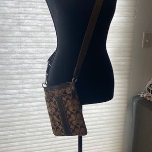 Coach cross Body with a matching clutch.